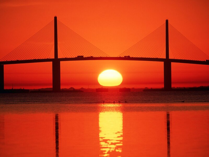 Sunset over Cable-stayed Bridge — Red, Dramatic, Photograph, Sun, Water