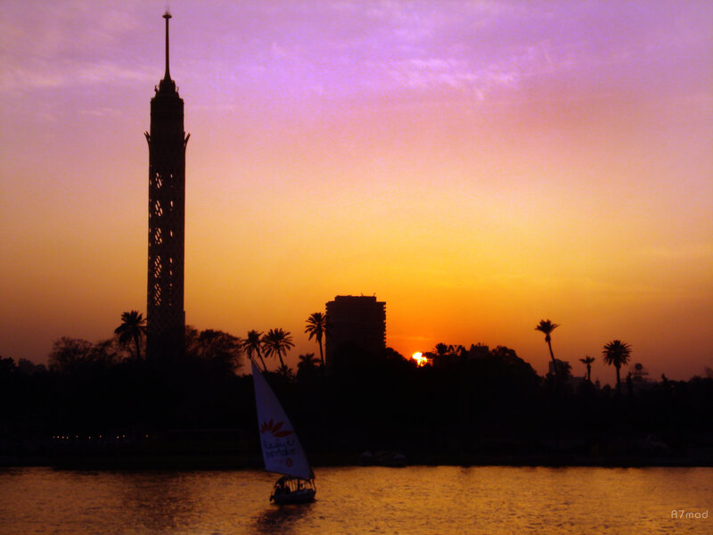 sunset over cairo with sailboat