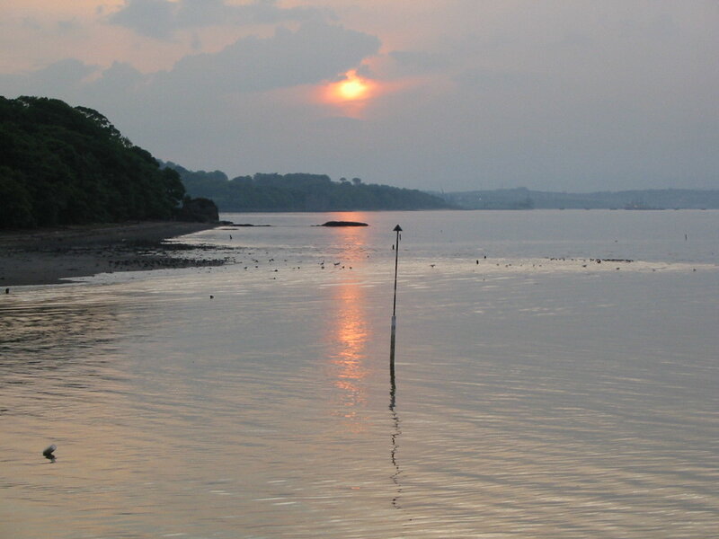 sunset over calm bay