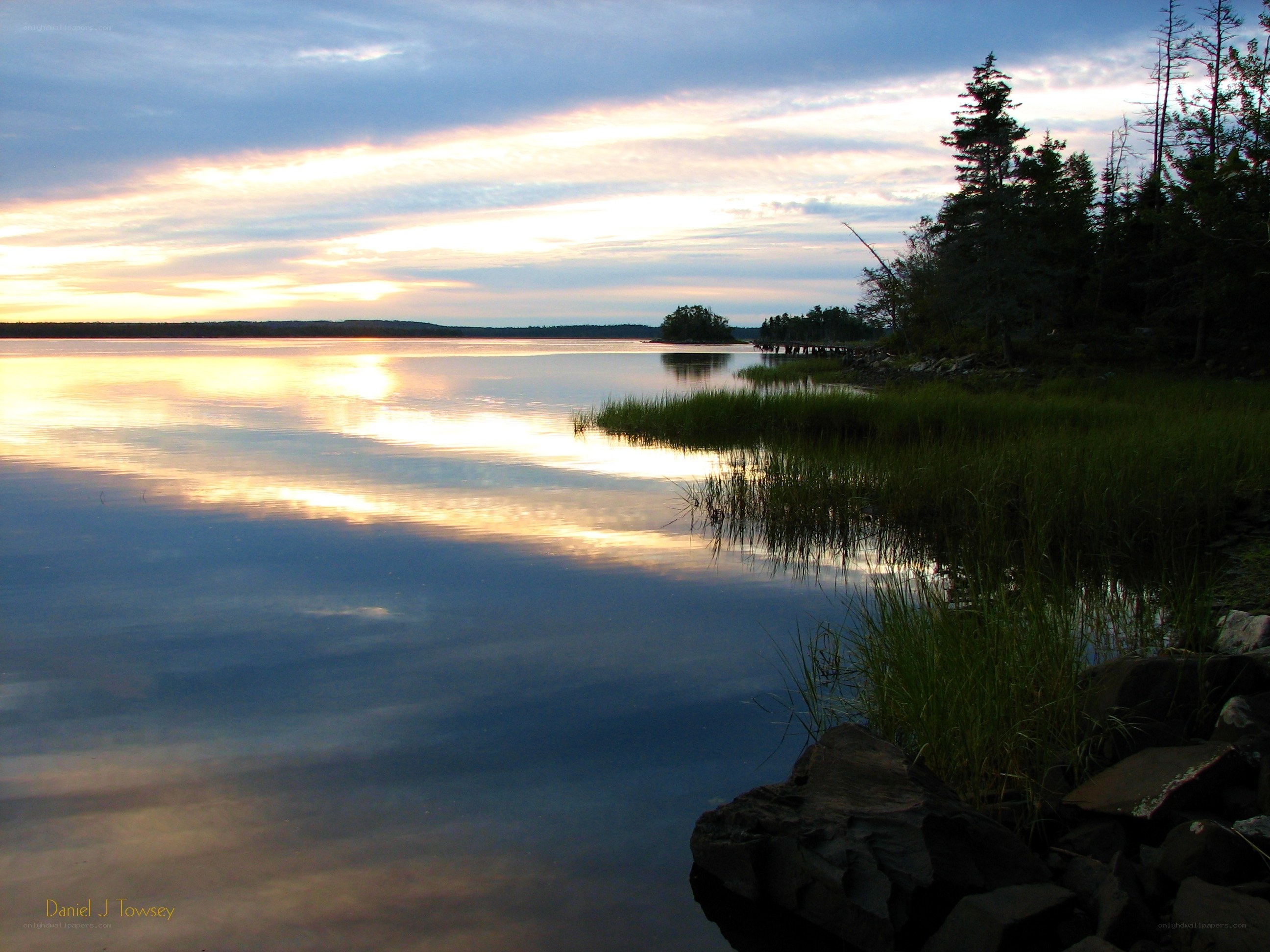 Sunset over calm lake