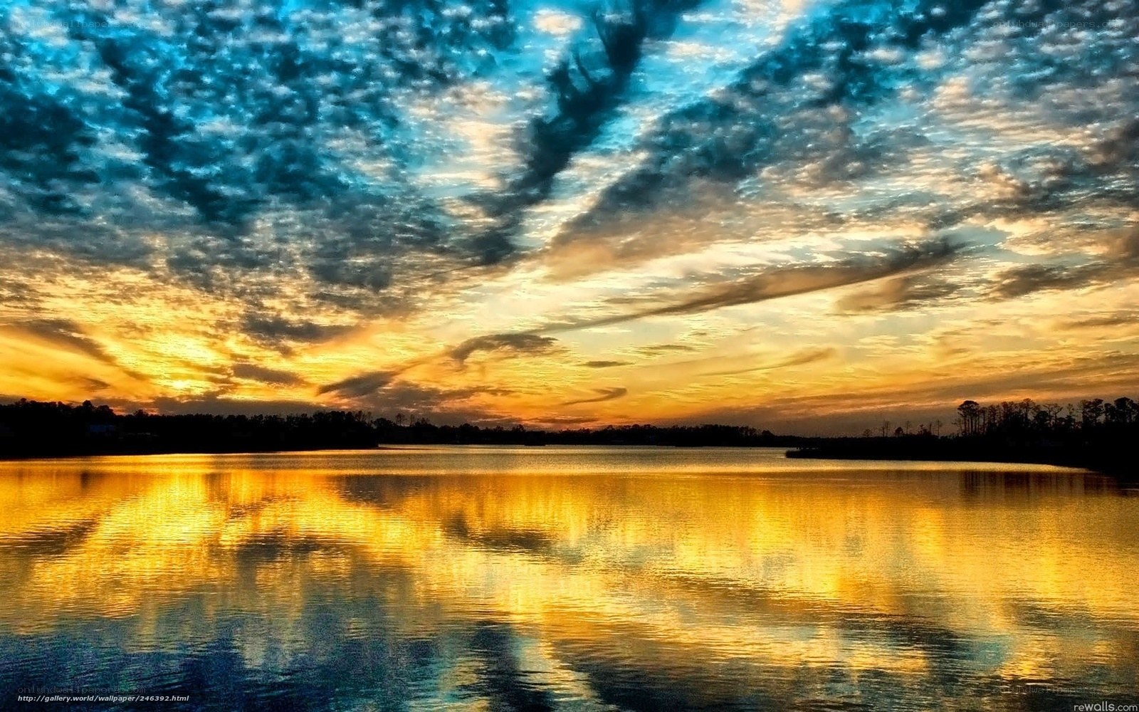sunset over calm lake