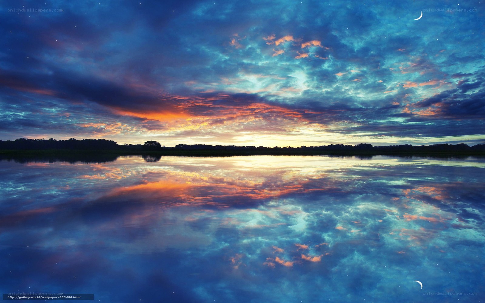 Sunset over calm lake