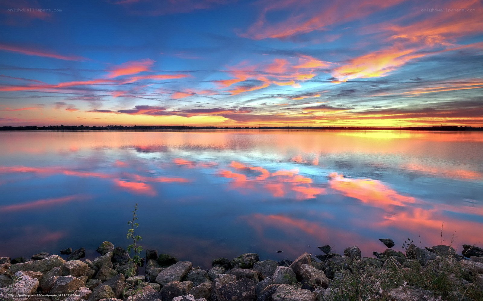 Sunset over calm lake