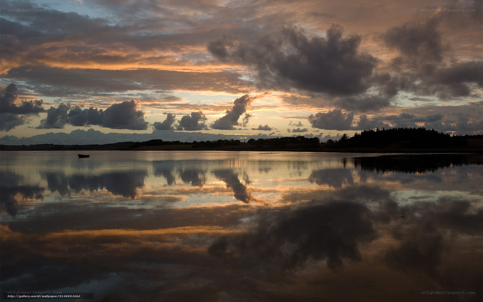 Sunset over calm lake