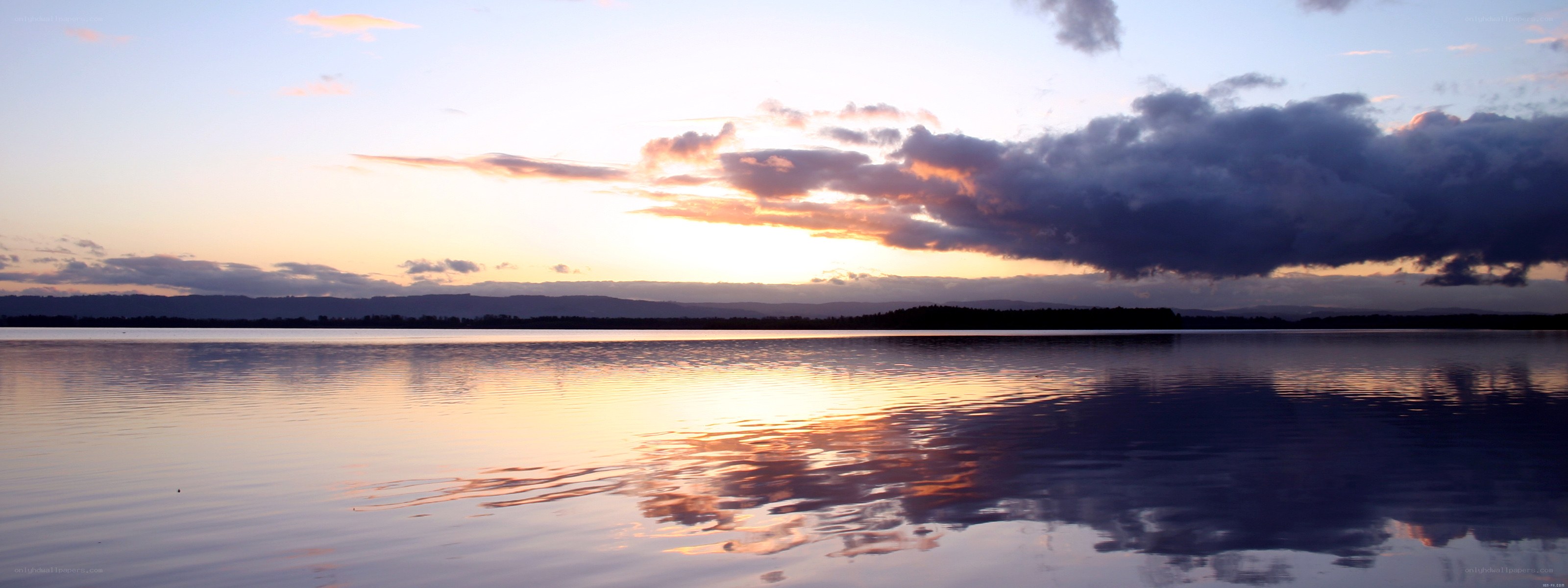 Sunset over calm lake