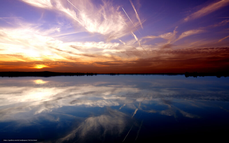 Sunset over calm lake