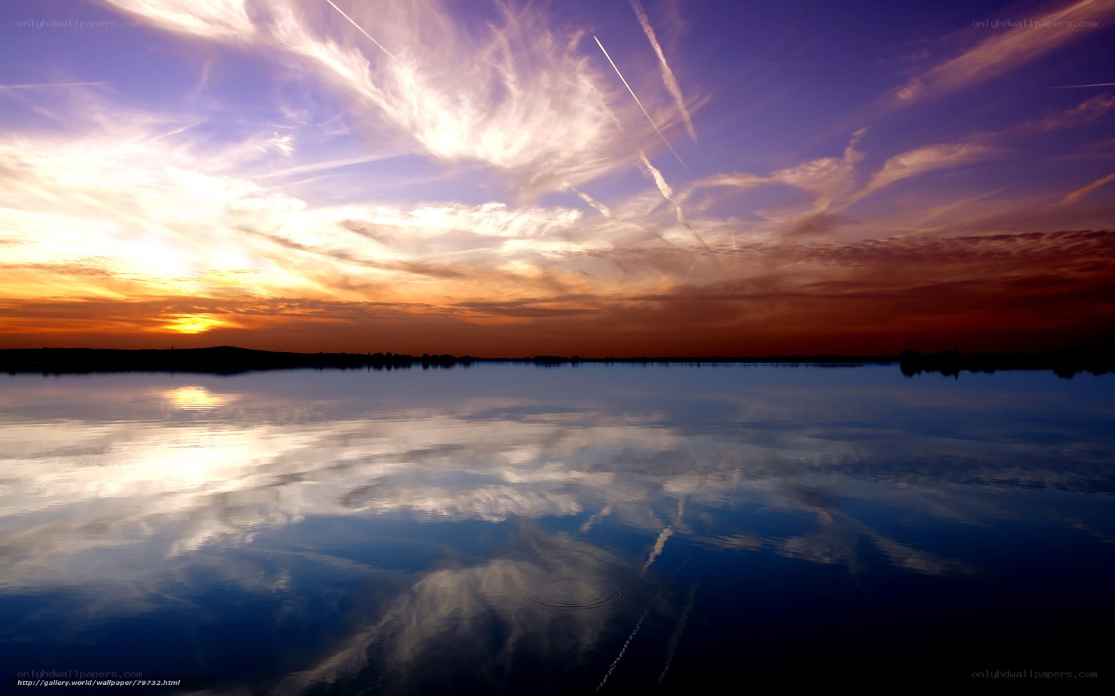 Sunset over calm lake
