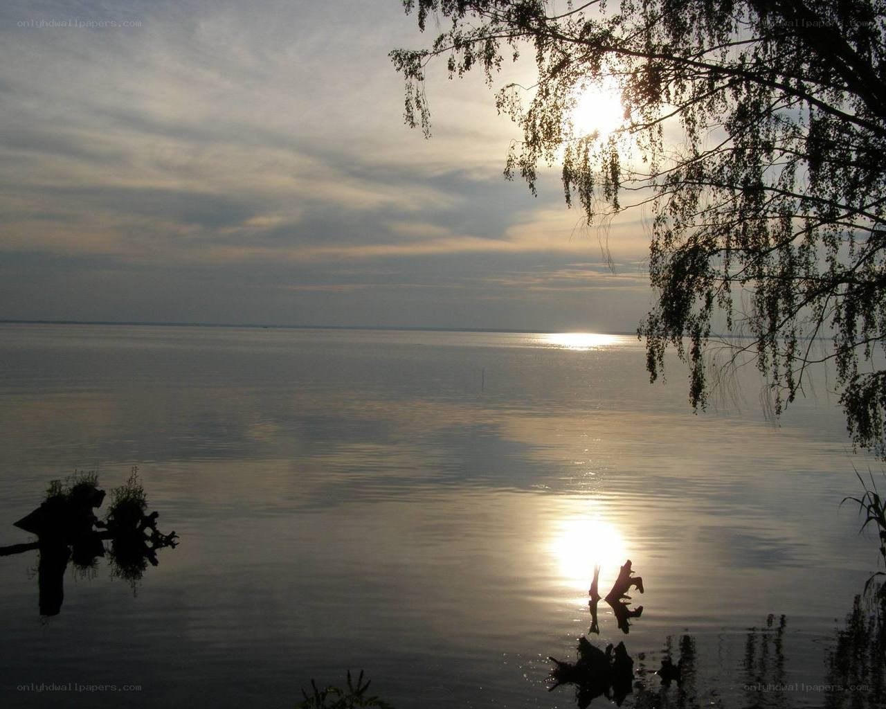 Sunset over calm lake