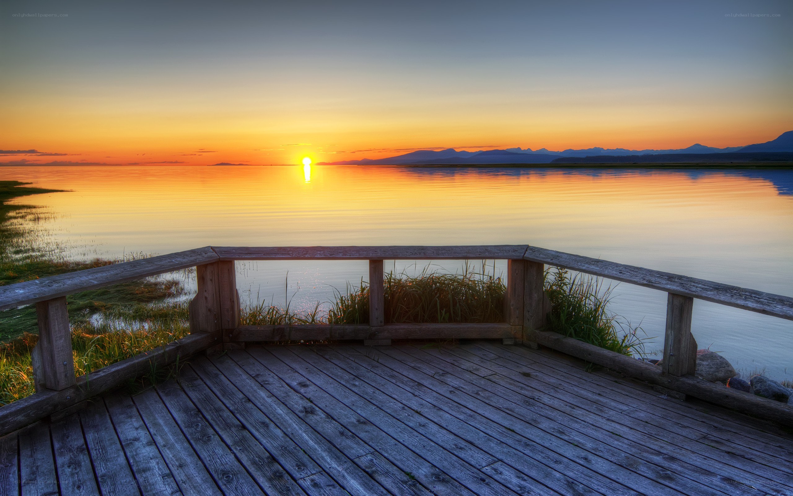 Sunset over calm lake