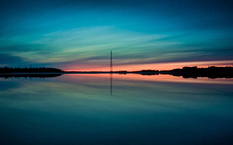 sunset over calm lake