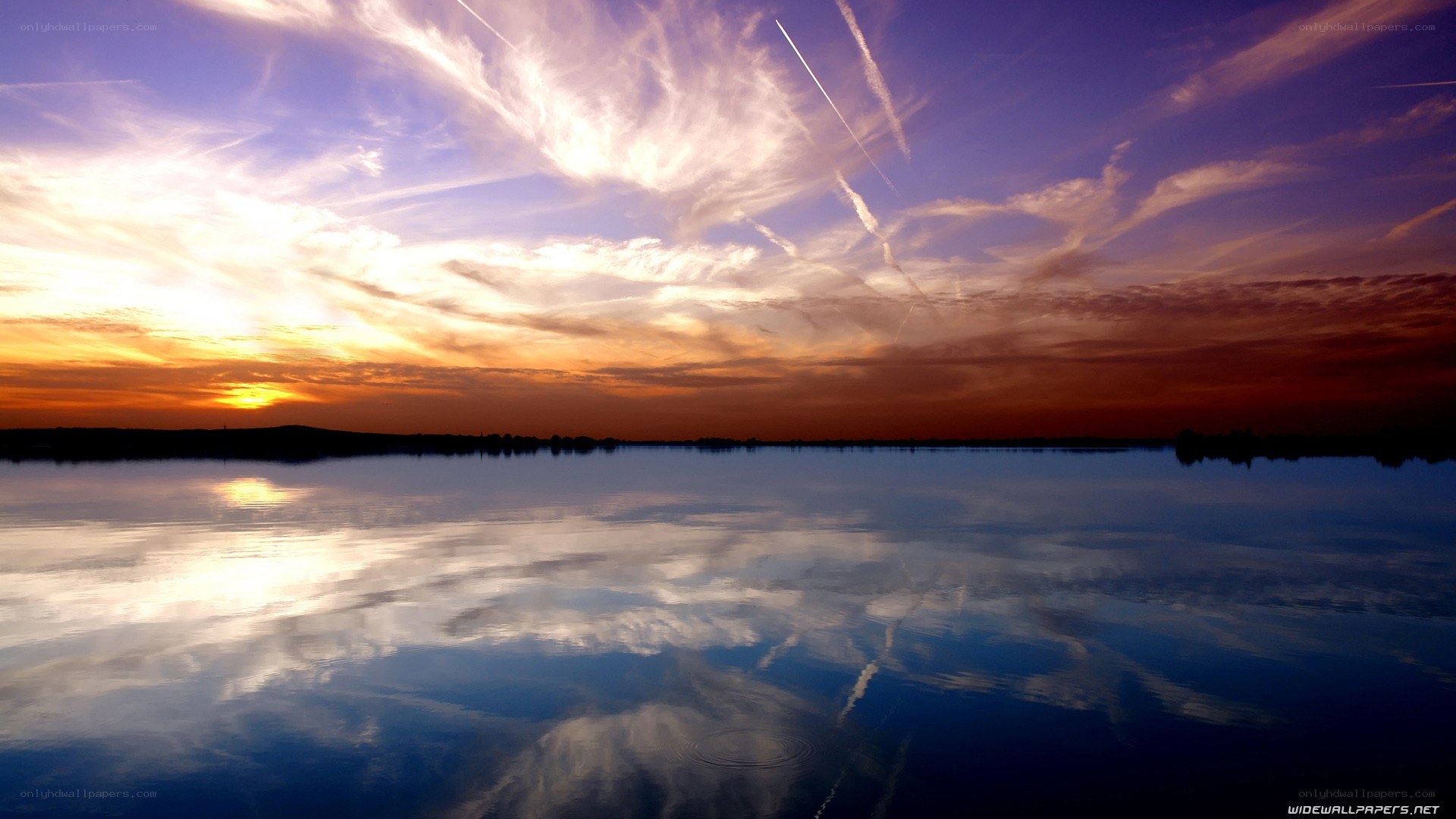 Sunset over calm lake
