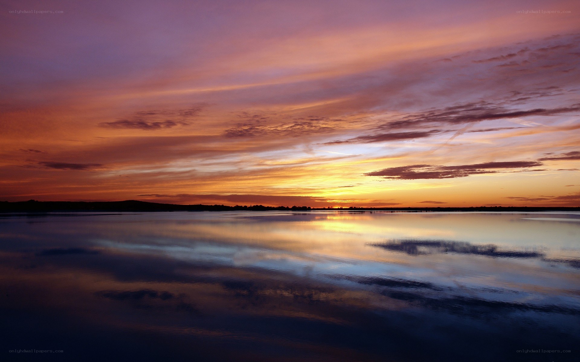 Sunset over calm lake