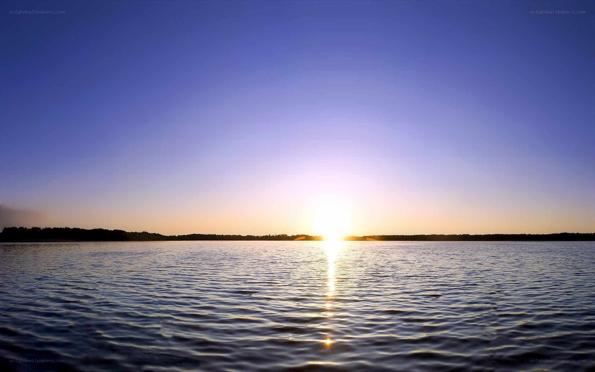 Sunset over calm lake