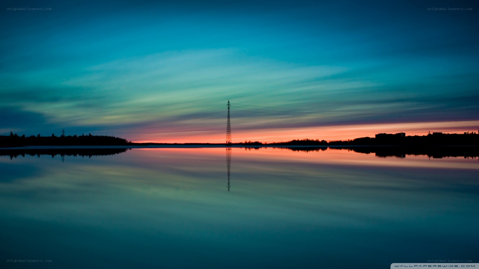 sunset over calm lake