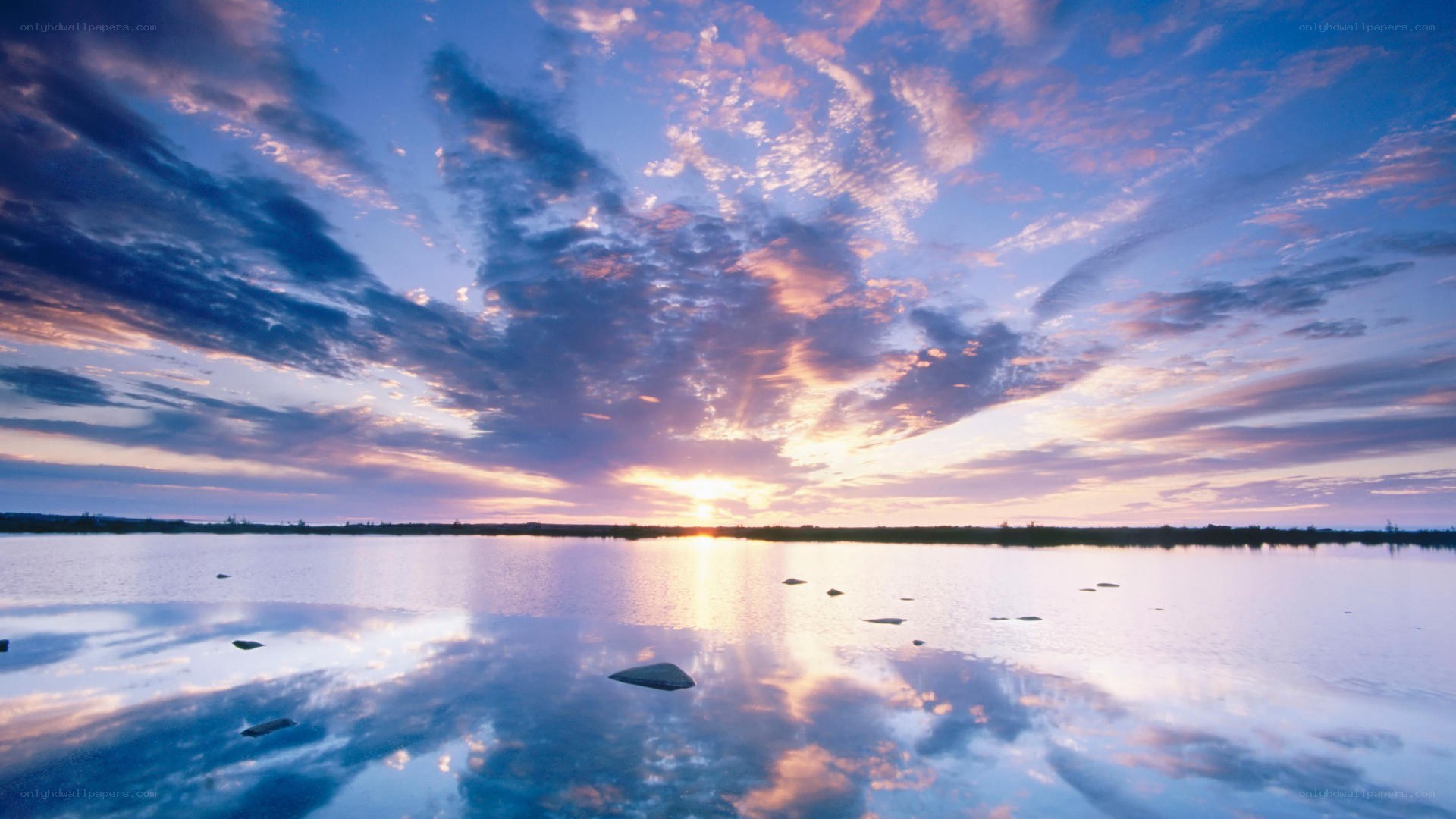 Sunset over calm lake