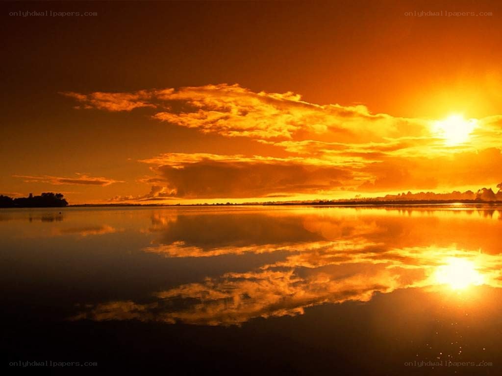Sunset over calm lake