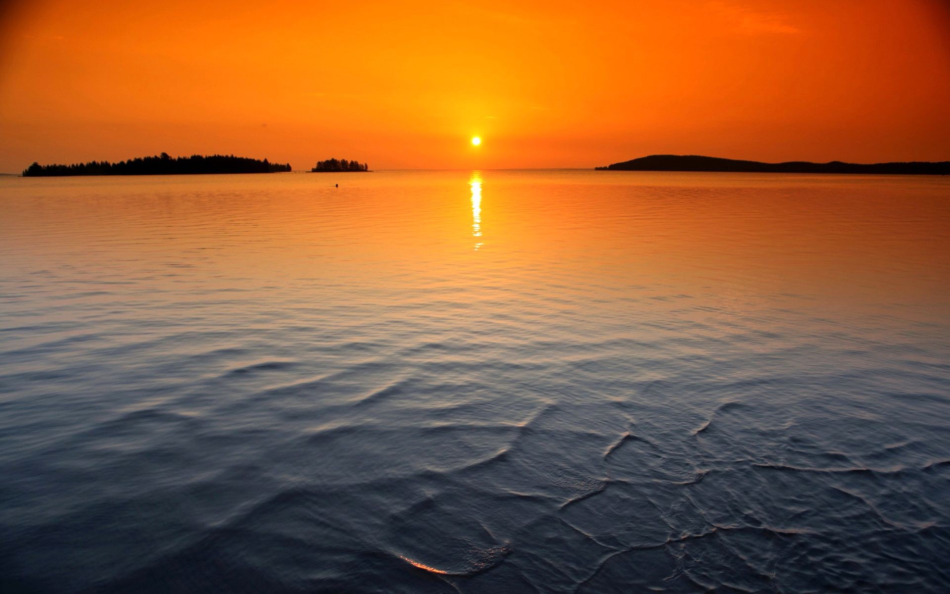Sunset over calm lake