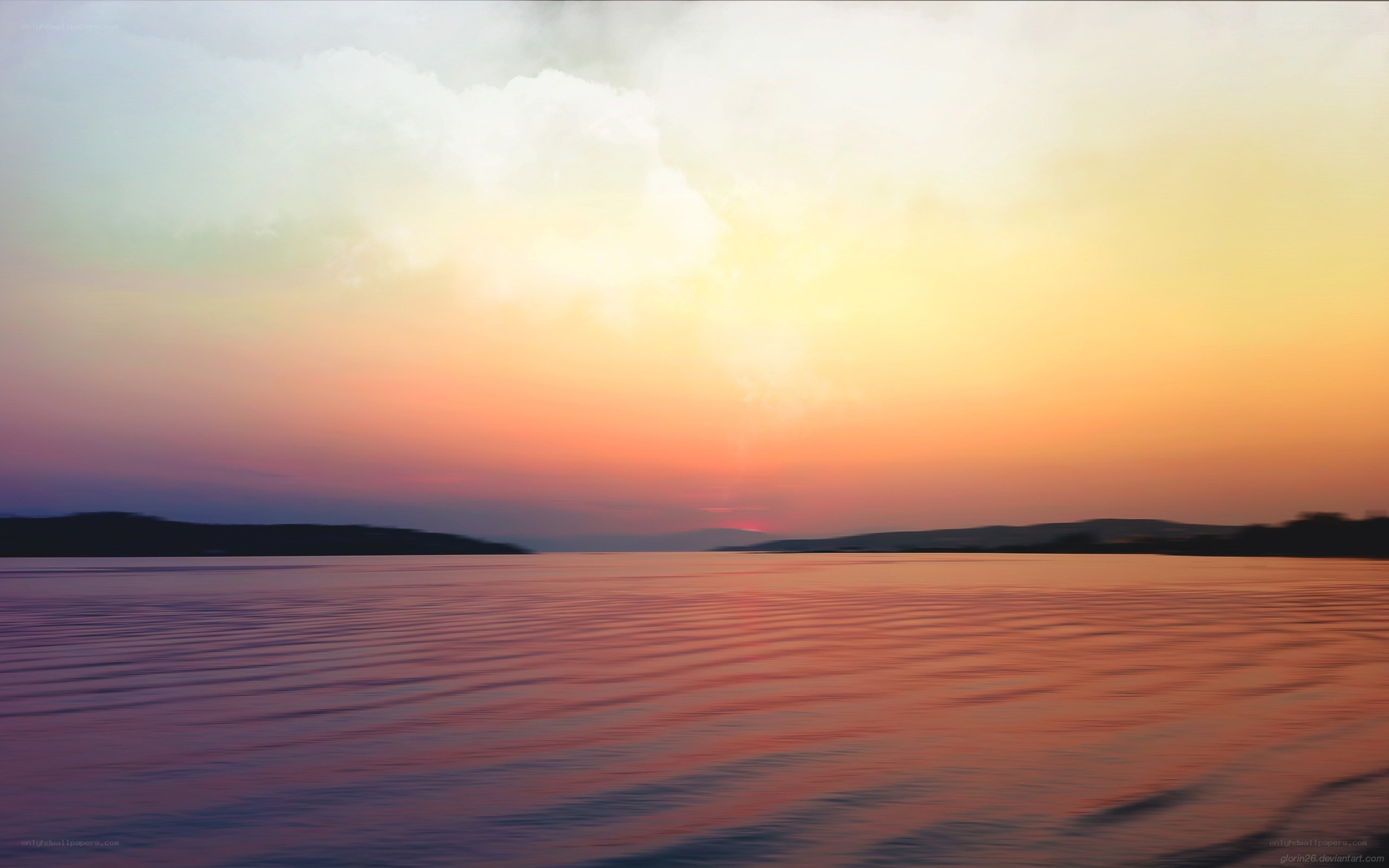 sunset over calm lake