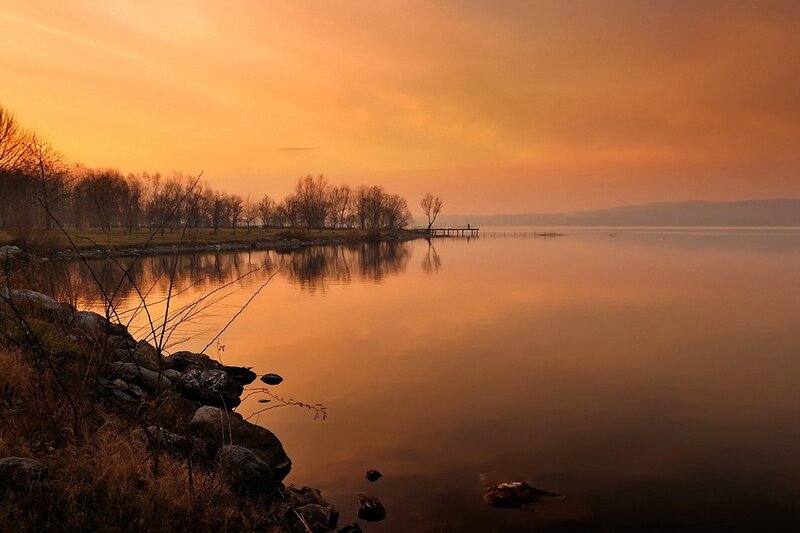 Sunset over Calm Lake — Orange, Serene, Photograph, Trees, Dock