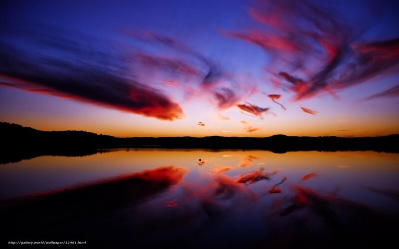 Sunset over calm lake