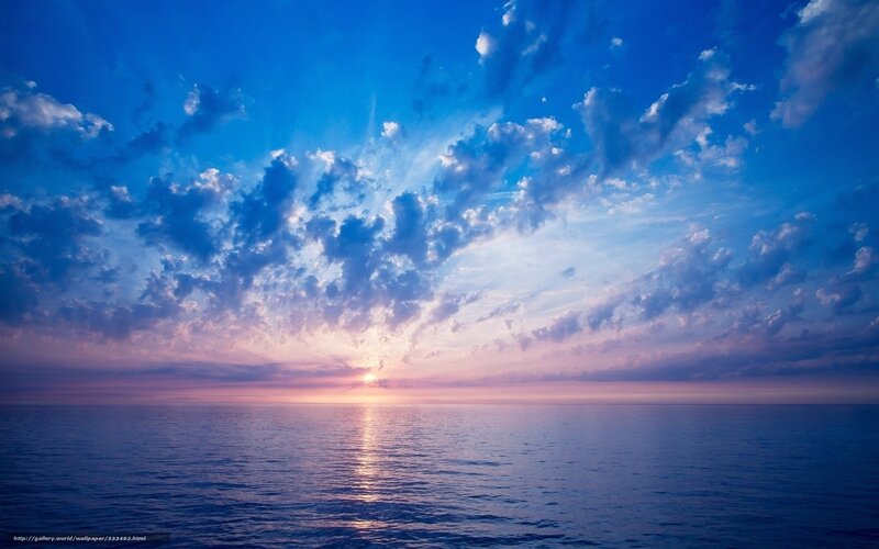 Sunset over calm ocean