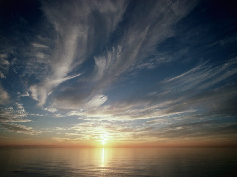 Sunset over calm ocean