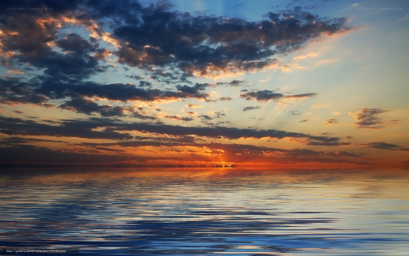 sunset over calm ocean