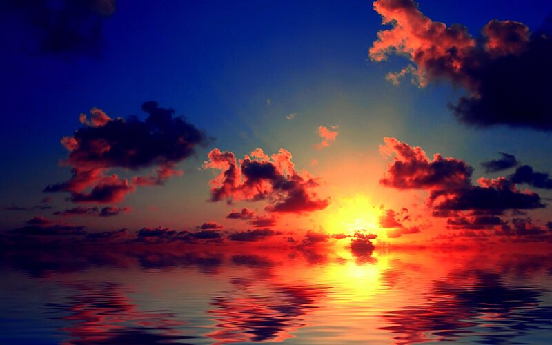 sunset over calm ocean
