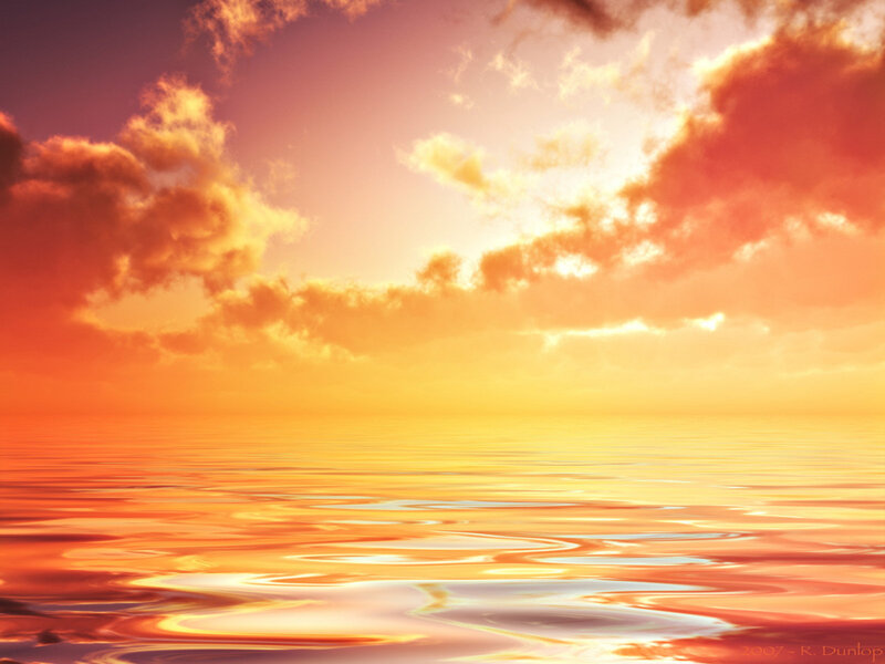 sunset over calm ocean