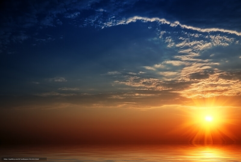 sunset over calm ocean