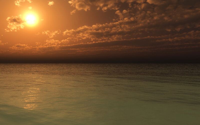 sunset over calm ocean