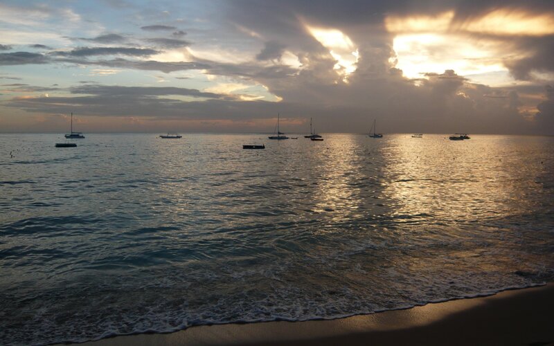 sunset over calm ocean