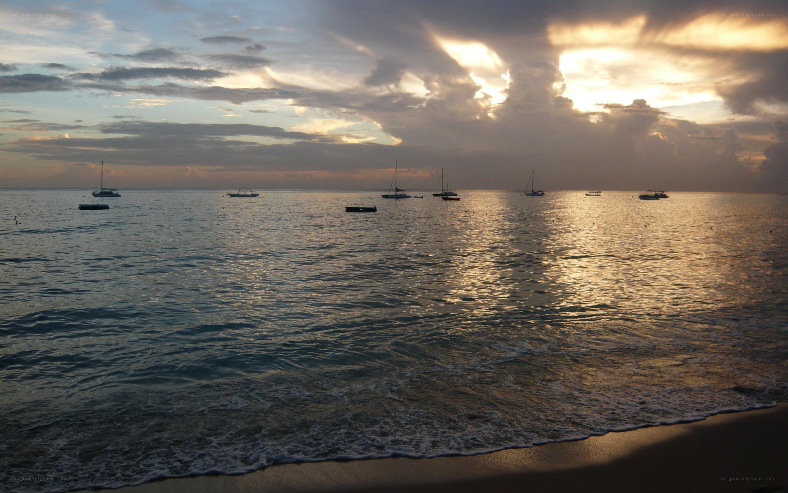 sunset over calm ocean