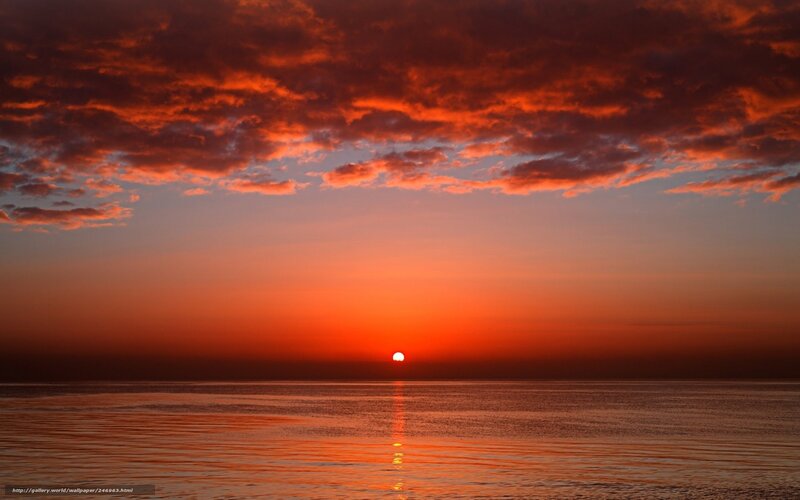 sunset over calm ocean