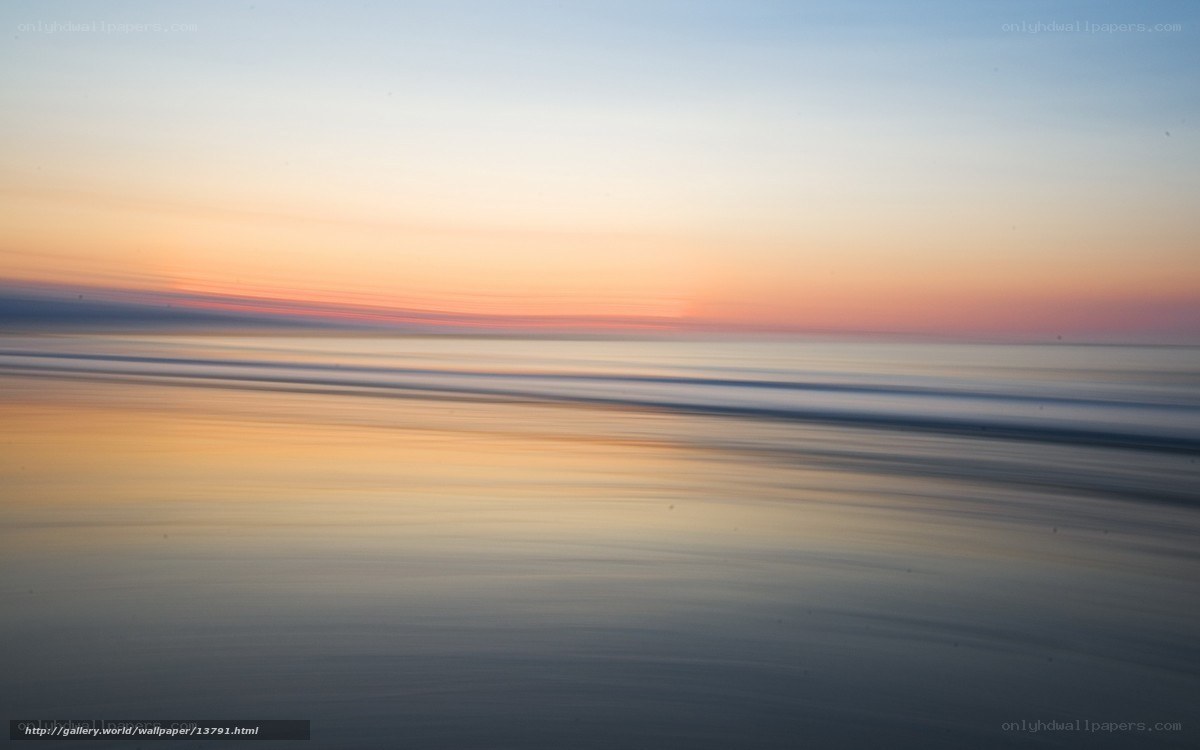 Sunset over calm ocean