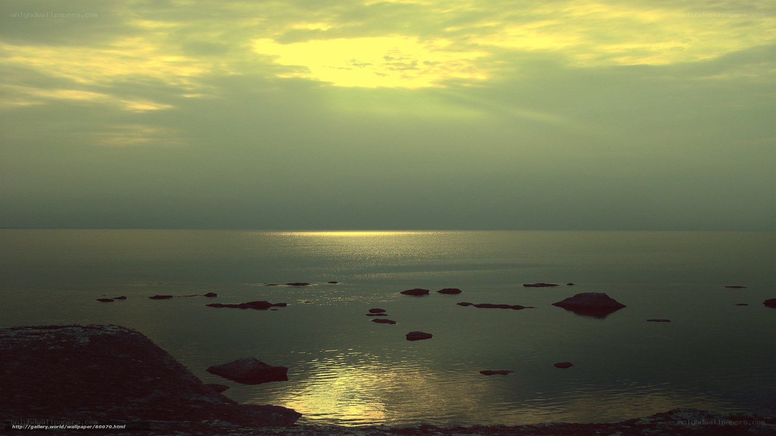 Sunset over calm sea