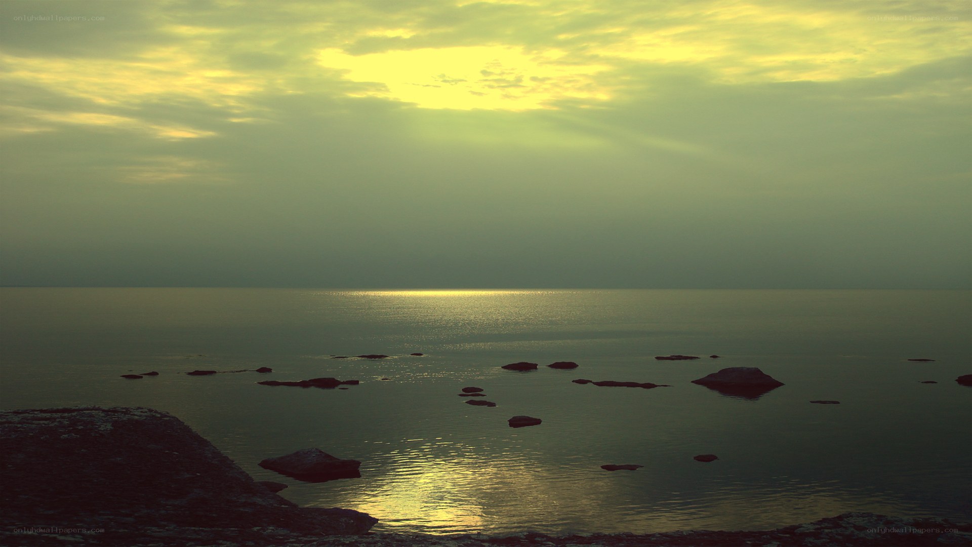 Sunset over calm sea