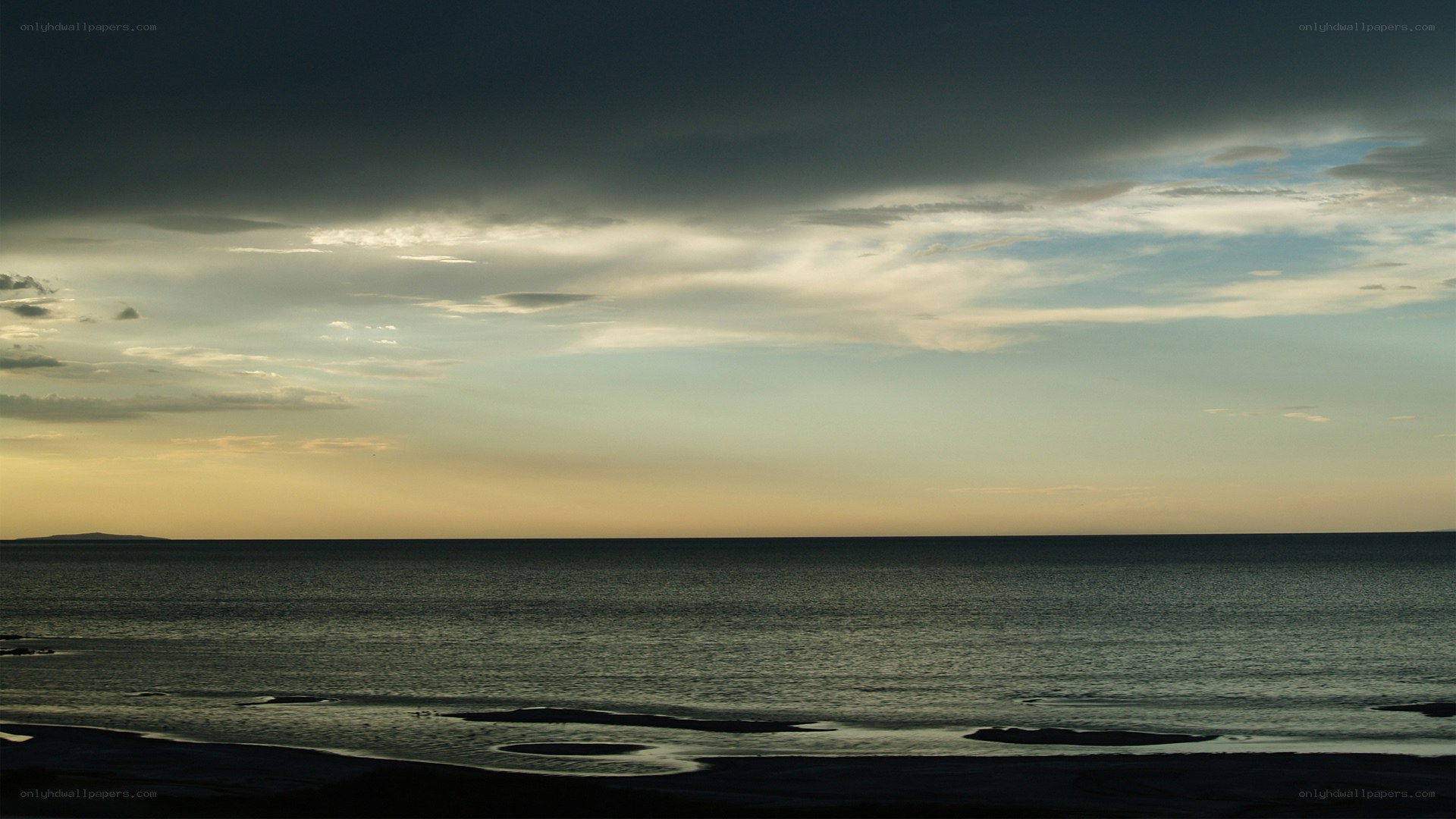 sunset over calm sea