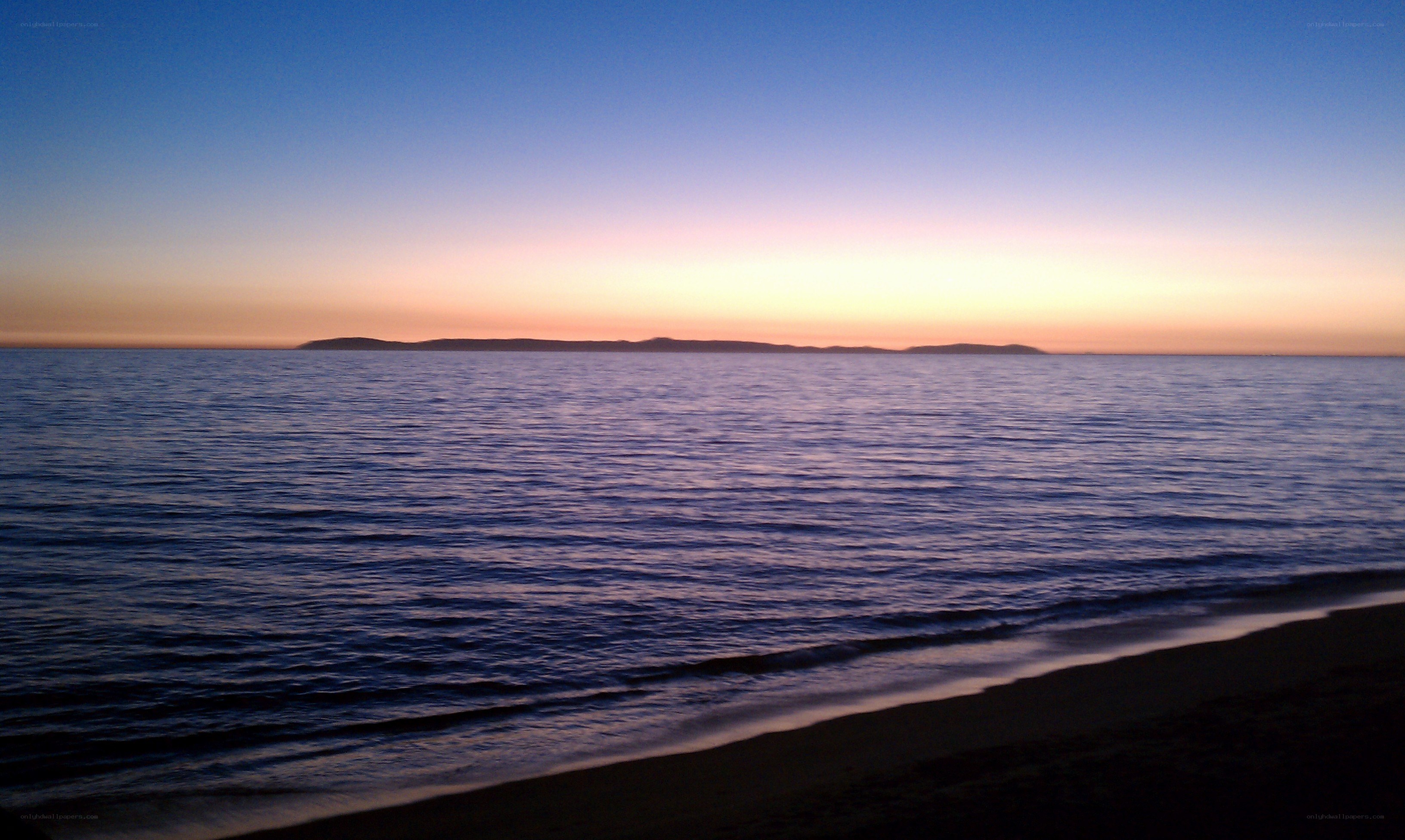 sunset over calm sea