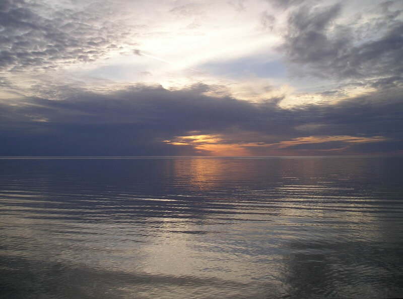 Sunset over calm sea