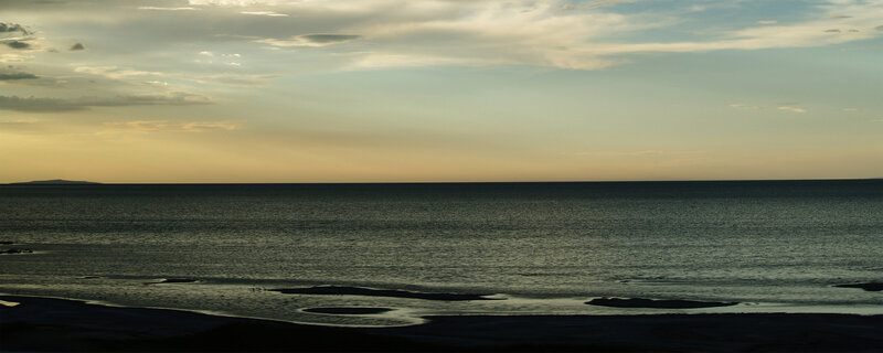 sunset over calm sea
