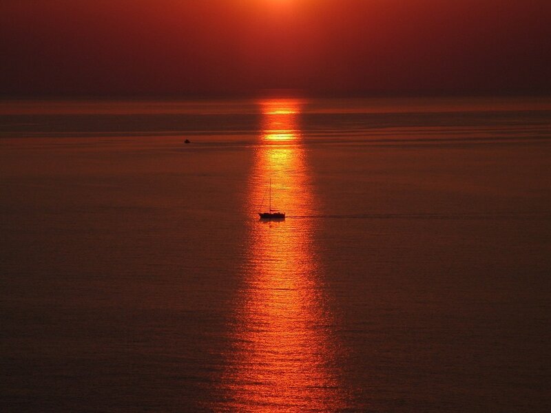 sunset over calm sea