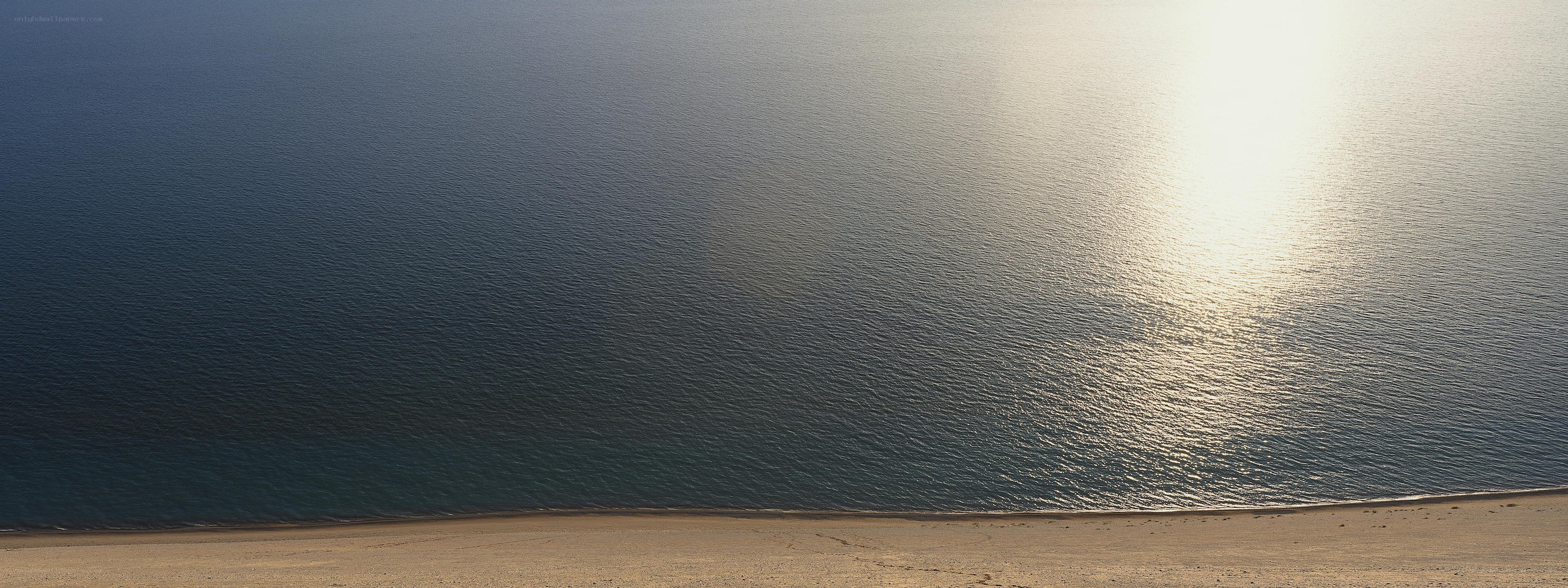 sunset over calm sea