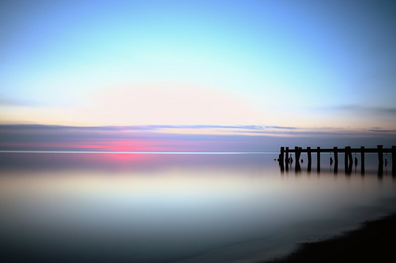 sunset over calm sea