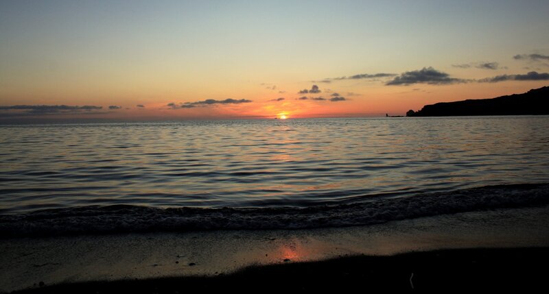 sunset over calm sea