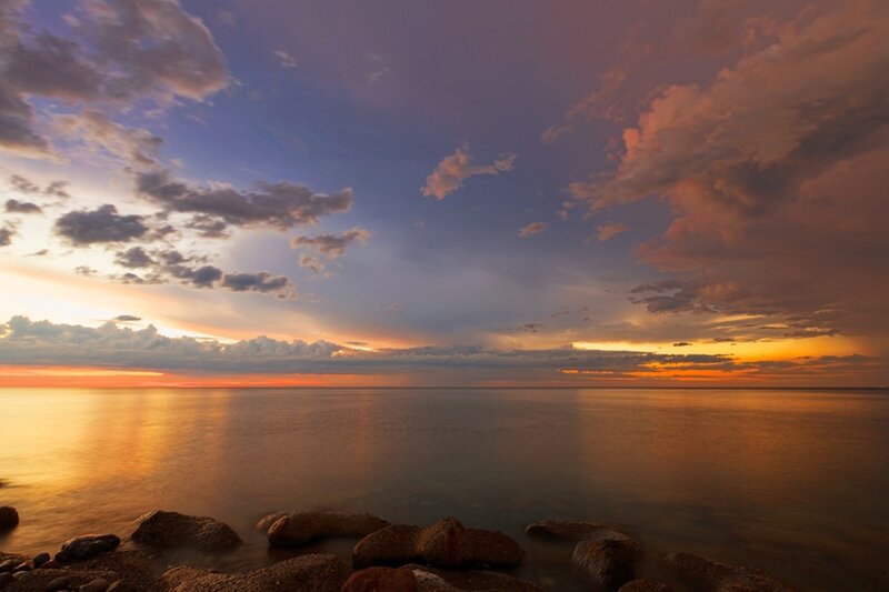 sunset over calm sea