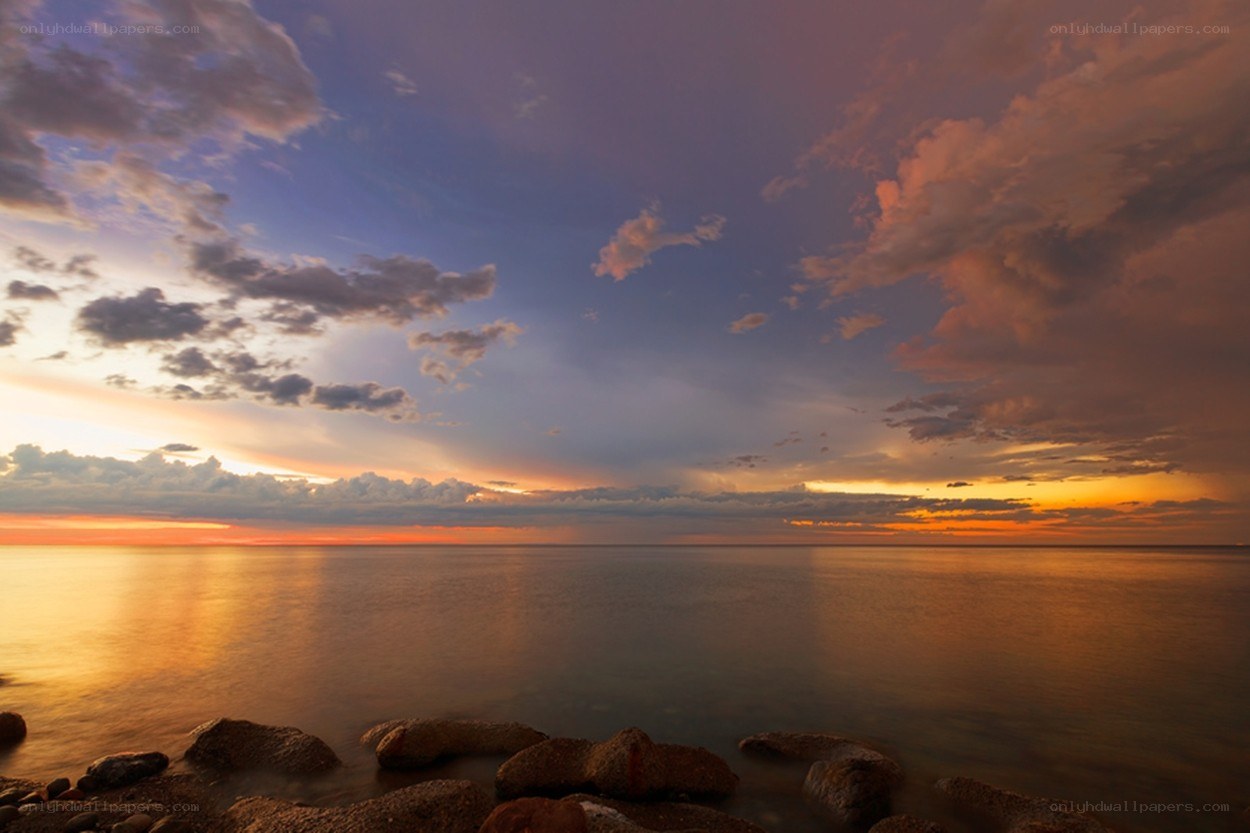 sunset over calm sea