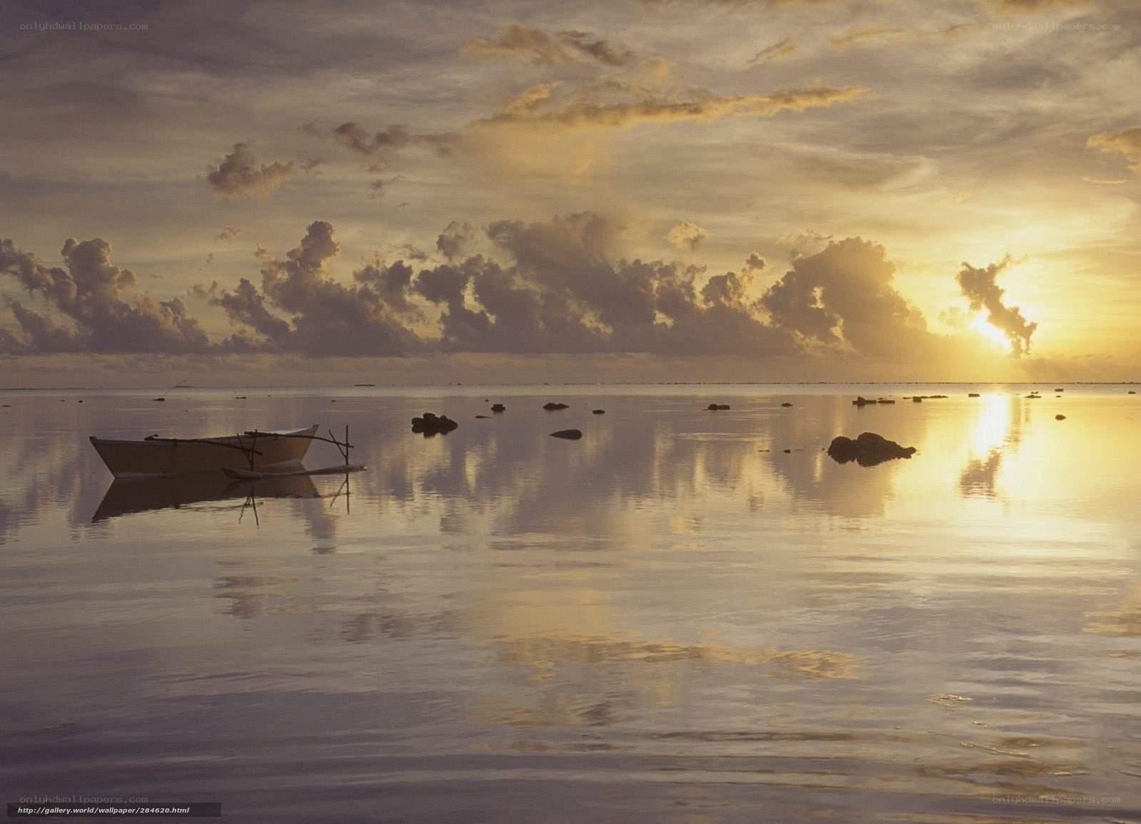 Sunset over calm sea