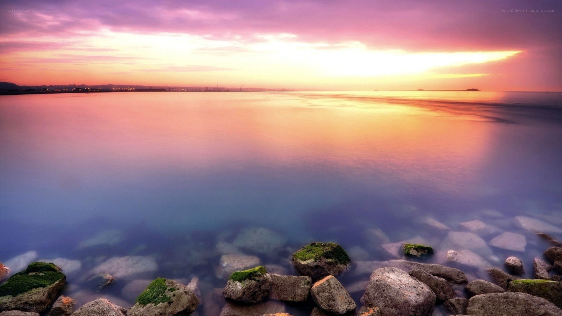 sunset over calm sea