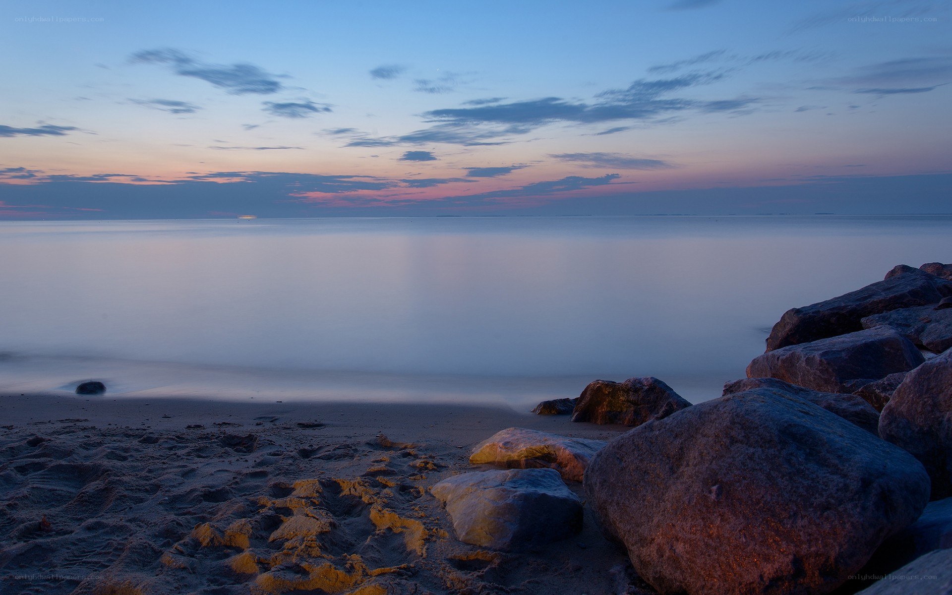 Sunset over calm sea